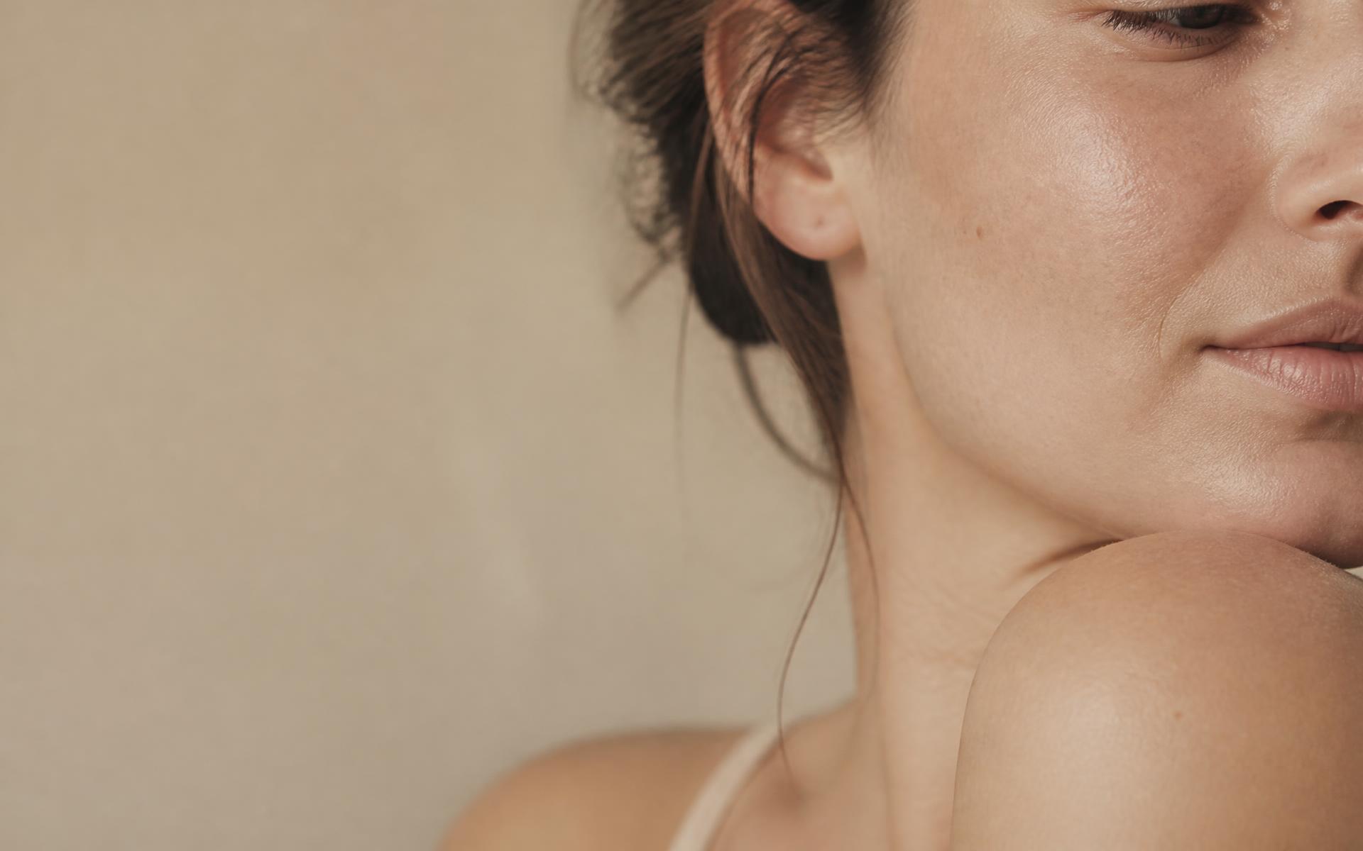 Close-up of natural skin in warm daylight